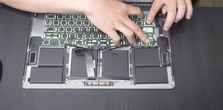 thay bàn phím macbook bị liệt phím
